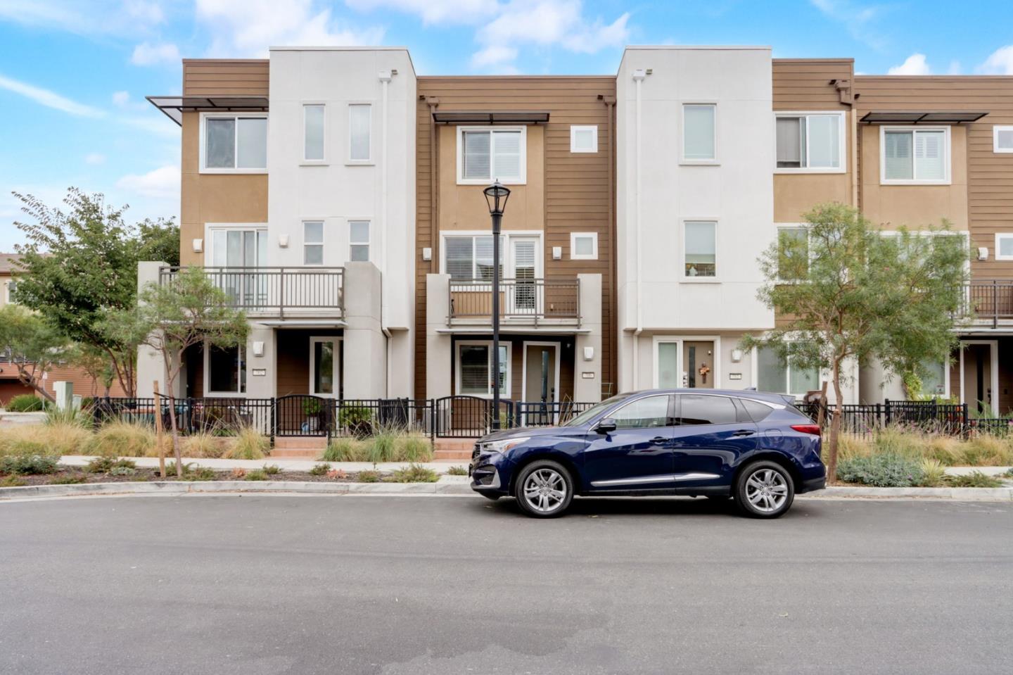 706 Ave One Drive San Jose, CA 95123 - Photo 36 of 60 a car parked in front of a building