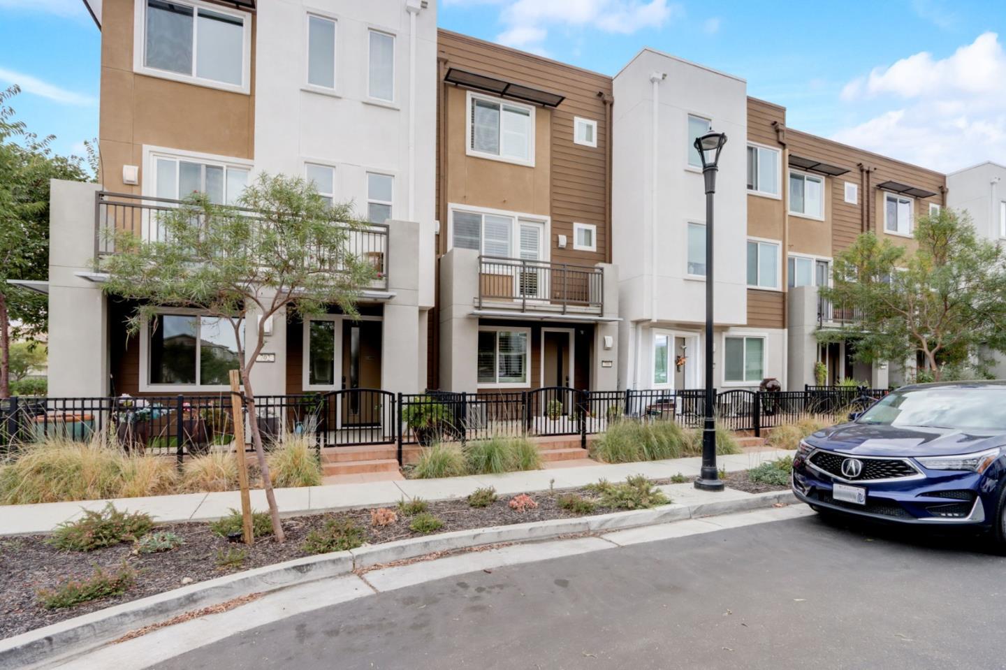 706 Ave One Drive San Jose, CA 95123 - Photo 38 of 60 a car parked in front of brick building