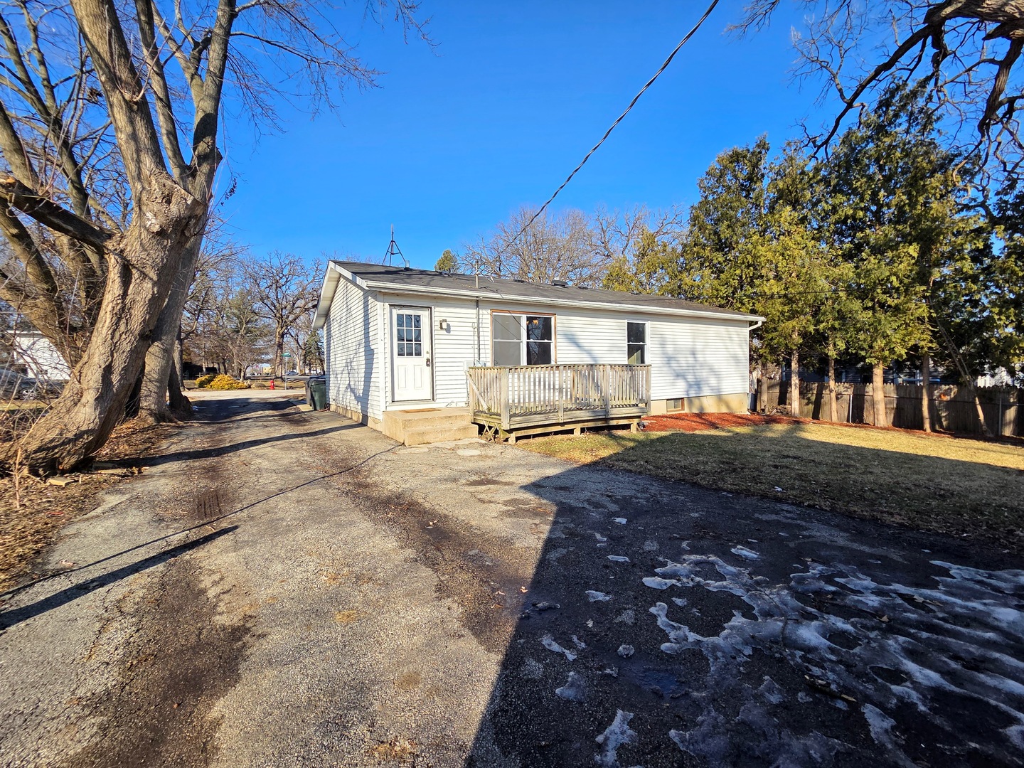 817 Tomahawk Trail Round Lake Heights, IL 60073 - Photo 19 of 22 a view of a house with a yard