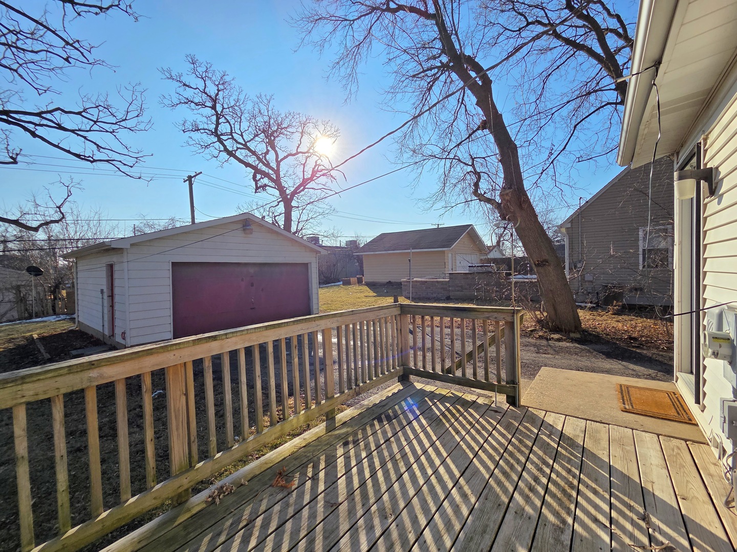 817 Tomahawk Trail Round Lake Heights, IL 60073 - Photo 21 of 22 a view of a house with wooden deck