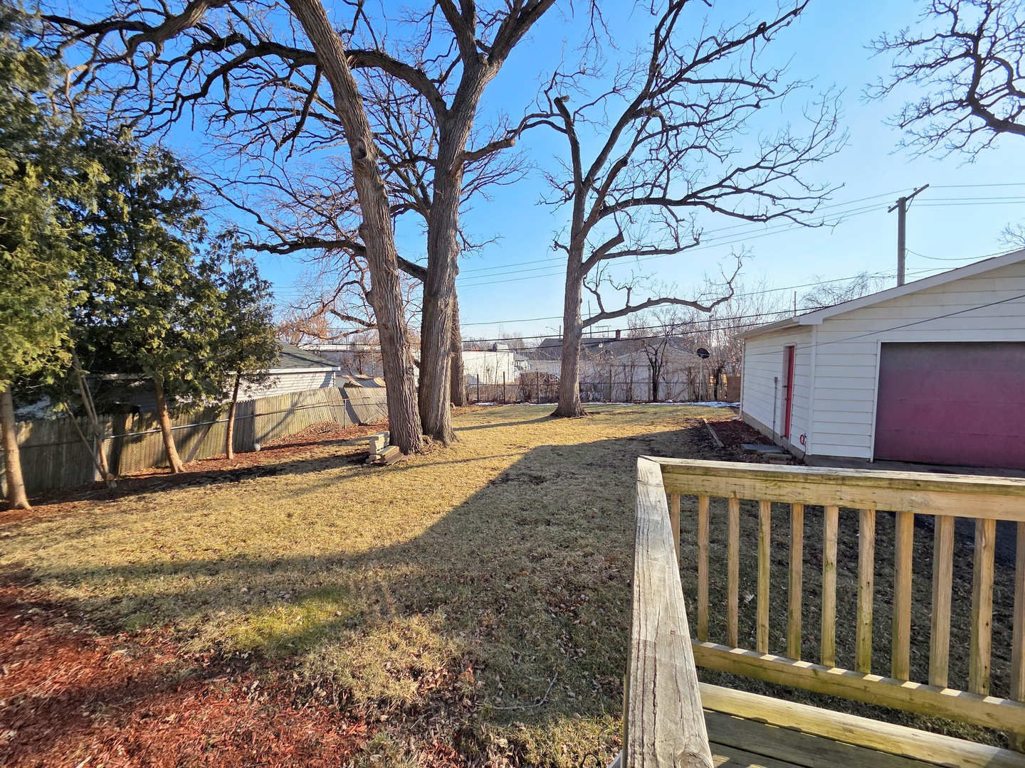 817 Tomahawk Trail Round Lake Heights, IL 60073 - Photo 22 of 22 a view of a yard with wooden fence