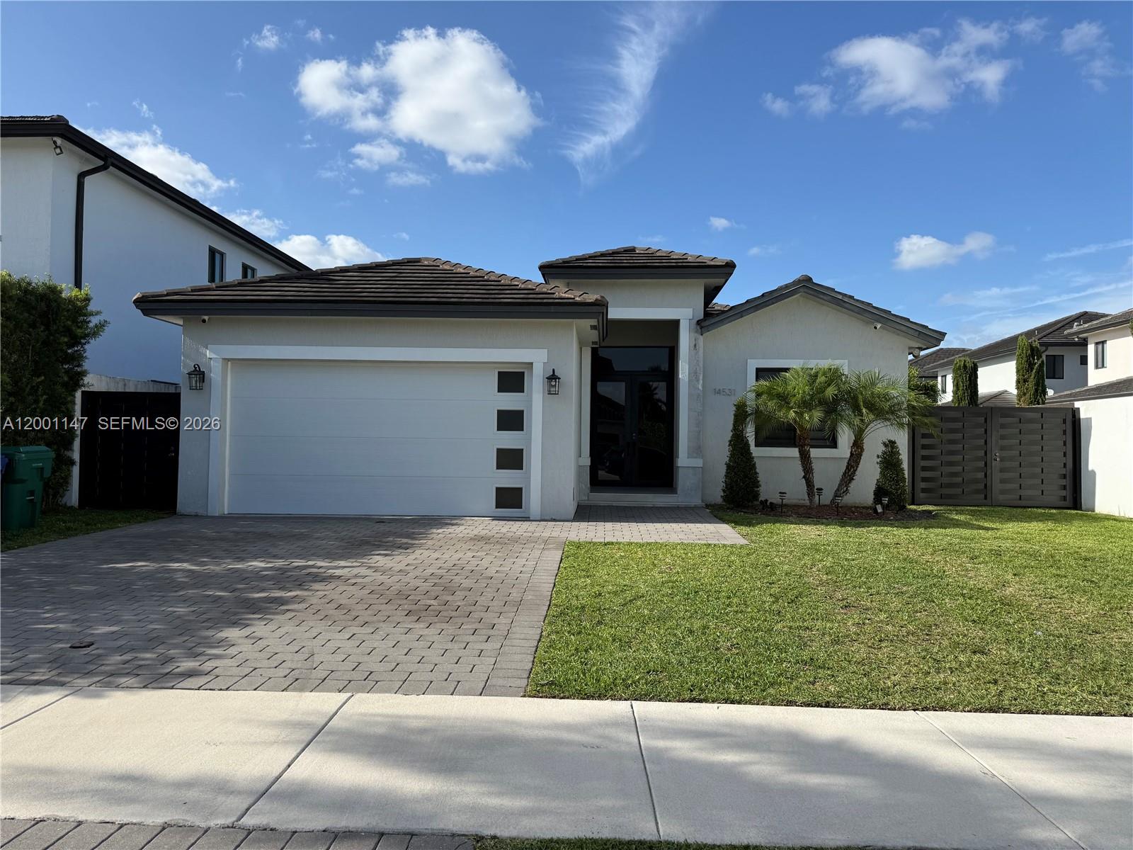 14531 Southwest 21st Street Miami, FL 33175 - Photo 1 of 25 a view of a backyard of the house