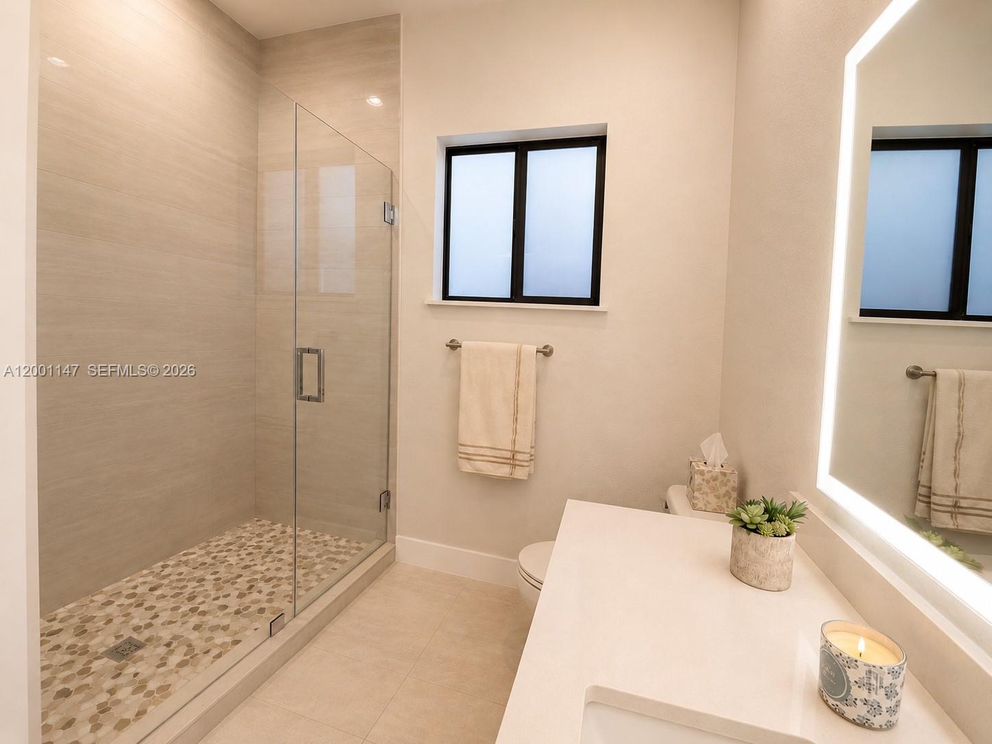 14531 Southwest 21st Street Miami, FL 33175 - Photo 19 of 25 a bathroom with a tub sink and shower