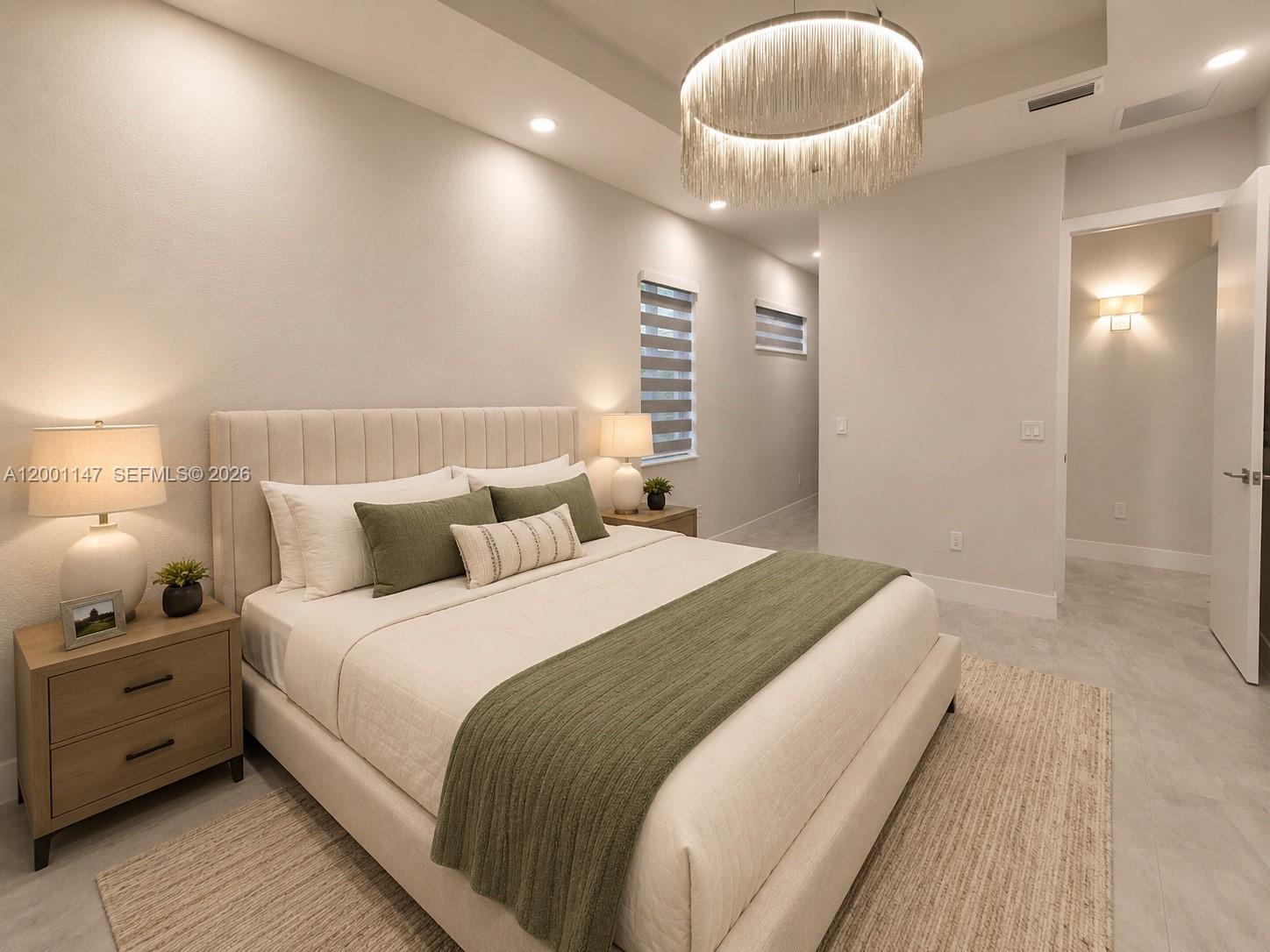 14531 Southwest 21st Street Miami, FL 33175 - Photo 24 of 25 a bedroom with bed and a chandelier