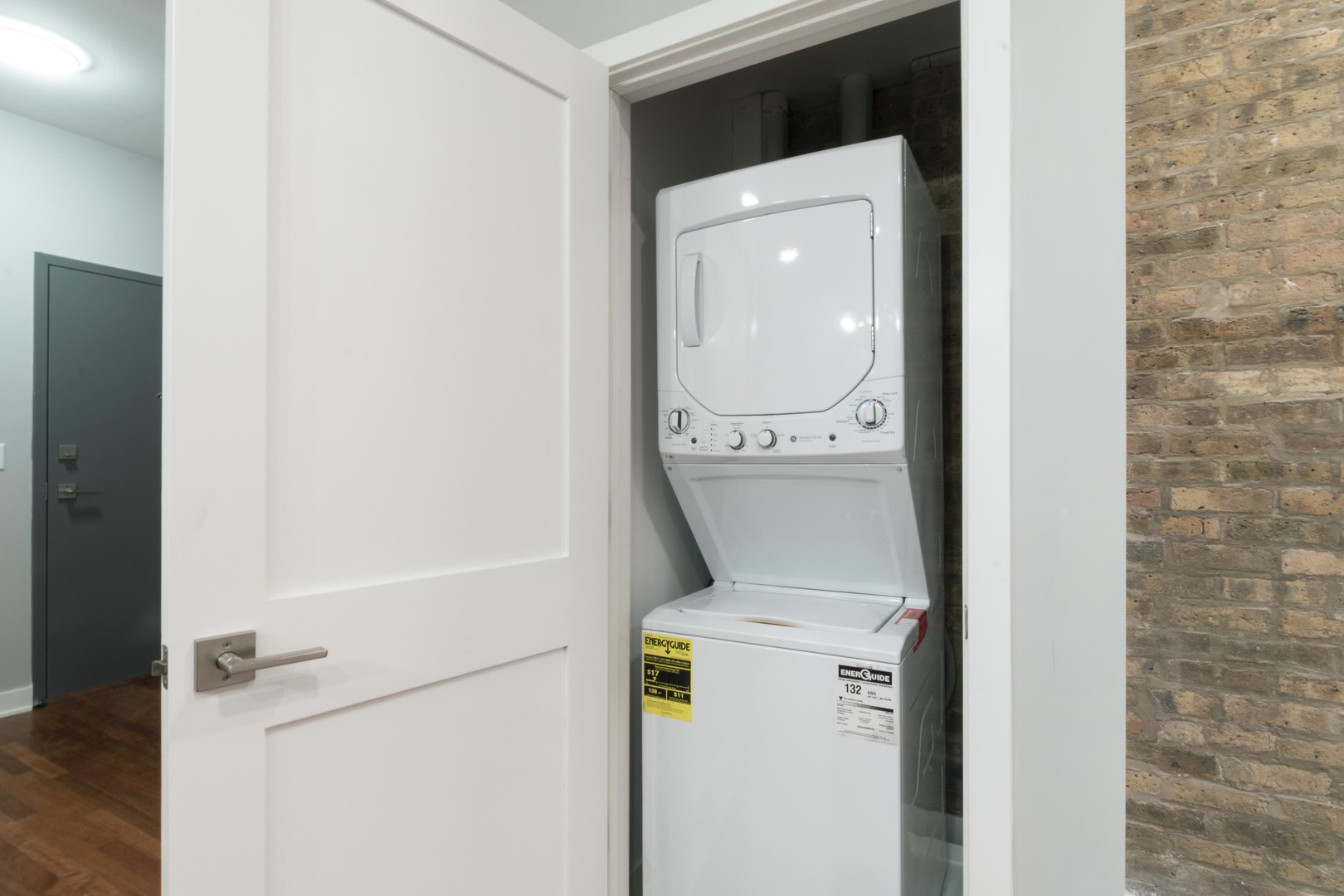 23 West Hubbard Street, Unit 4A Chicago, IL 60654 - Photo 8 of 8 a close up view of a washer and dryer