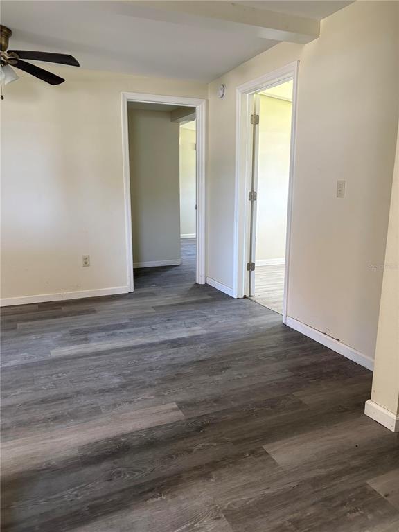 503 Myrtle Street Punta Gorda, FL 33950 - Photo 11 of 17 a view of an empty room with wooden floor and closet