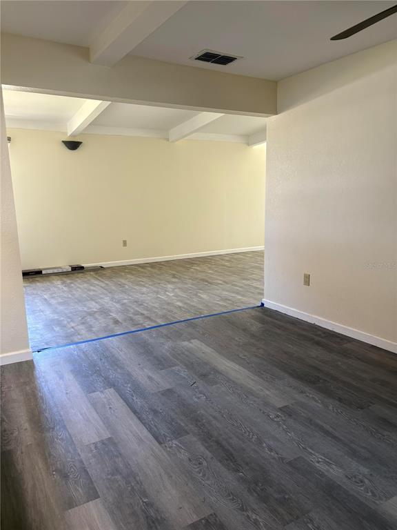 503 Myrtle Street Punta Gorda, FL 33950 - Photo 12 of 17 a view of a room with wooden floor