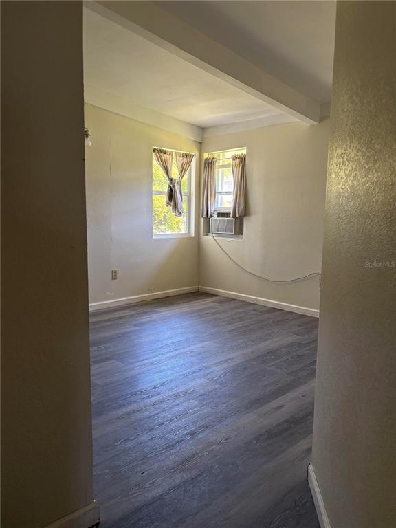 503 Myrtle Street Punta Gorda, FL 33950 - Photo 13 of 17 an empty room with windows and mirror