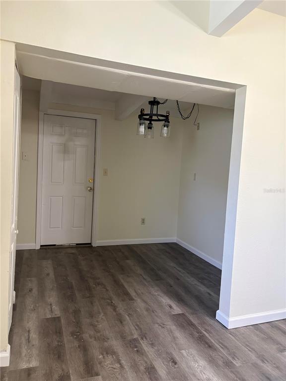 503 Myrtle Street Punta Gorda, FL 33950 - Photo 9 of 17 a view of a room with wooden floor