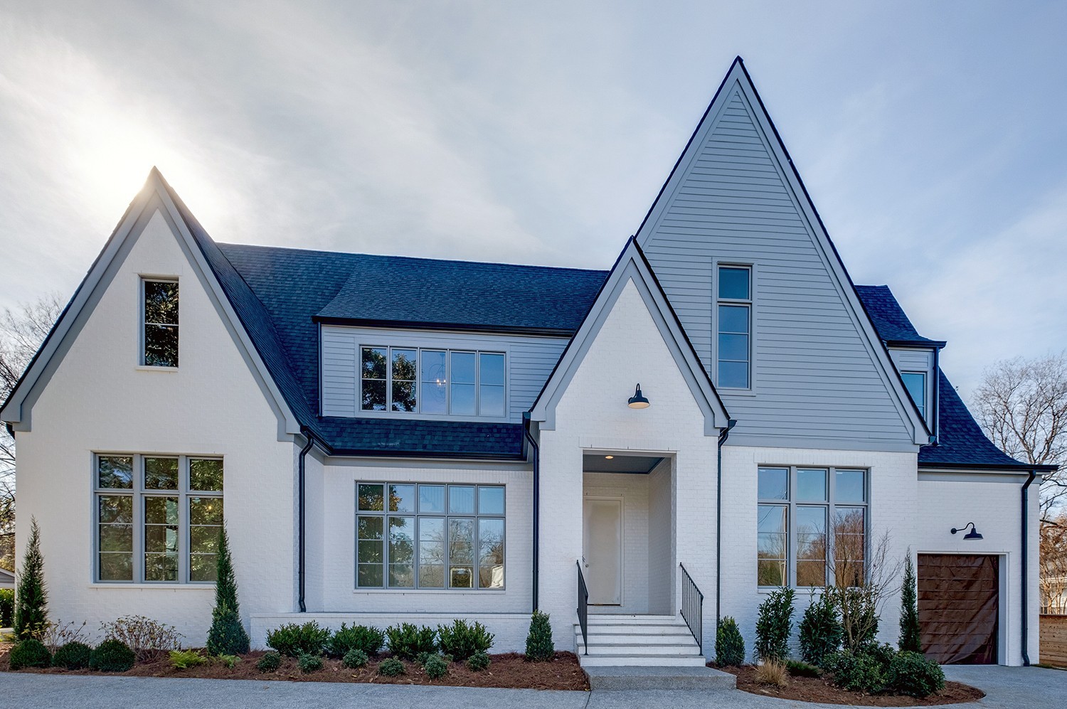 a view of a house with brick walls