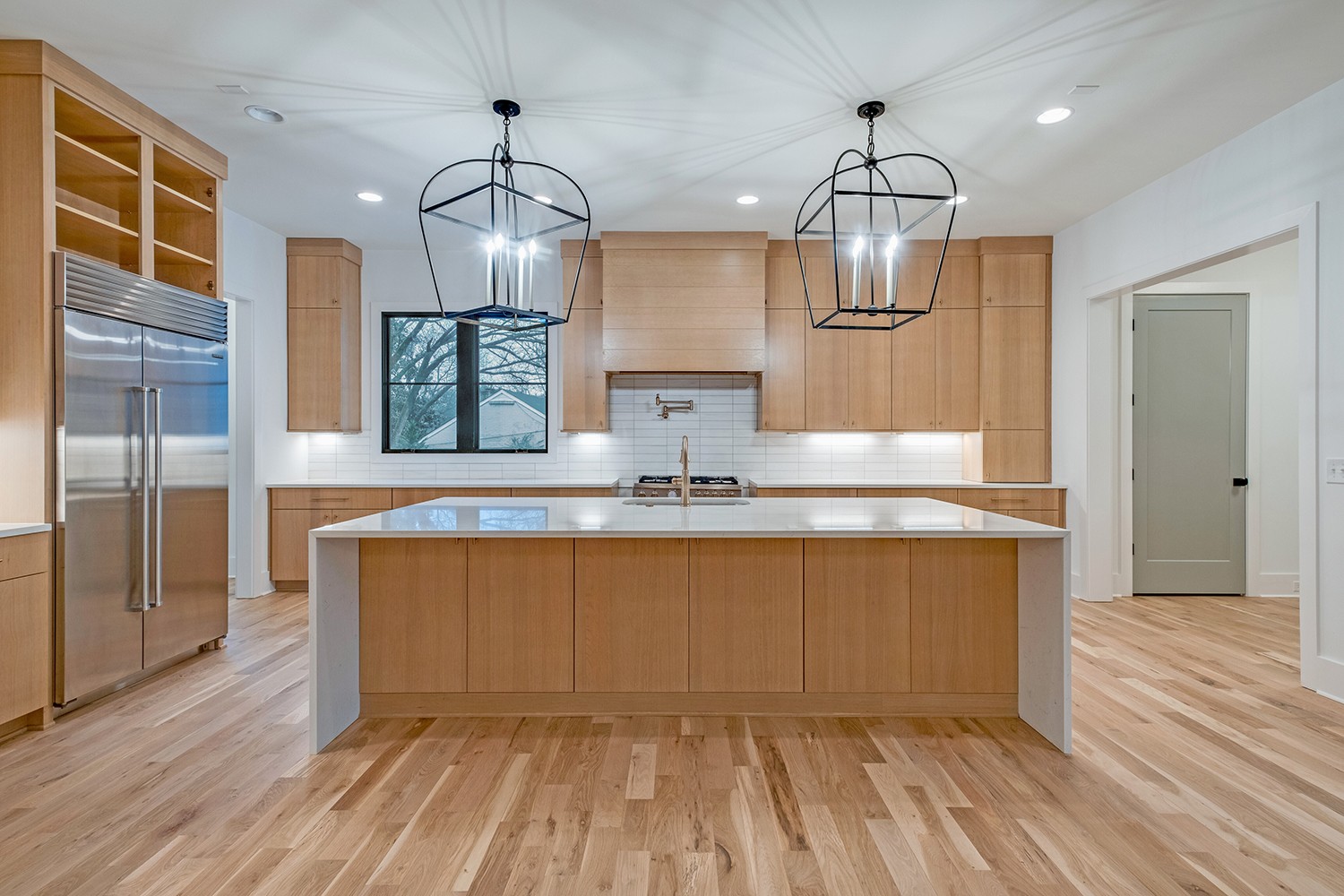 2825 Sugar Tree Road Nashville, TN 37215 - Photo 15 of 51 a view of kitchen with granite countertop cabinets and wooden floor