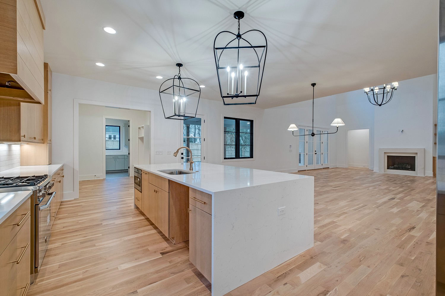 2825 Sugar Tree Road Nashville, TN 37215 - Photo 16 of 51 a large kitchen with stainless steel appliances kitchen island a large island in the center