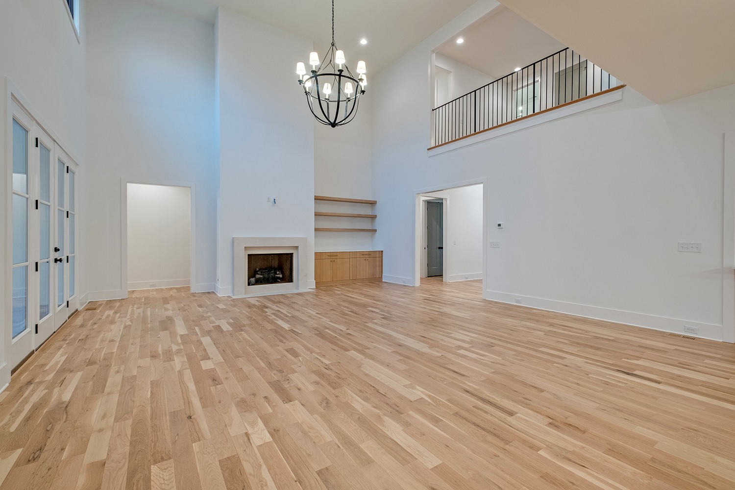 2825 Sugar Tree Road Nashville, TN 37215 - Photo 19 of 51 a view of empty room with wooden floor and fireplace