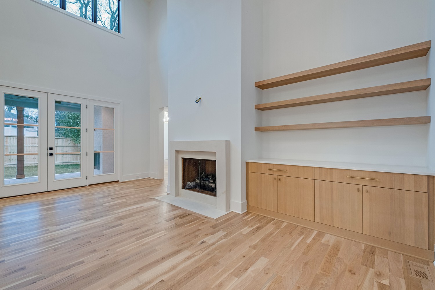 2825 Sugar Tree Road Nashville, TN 37215 - Photo 21 of 51 a view of empty room with wooden floor and fireplace