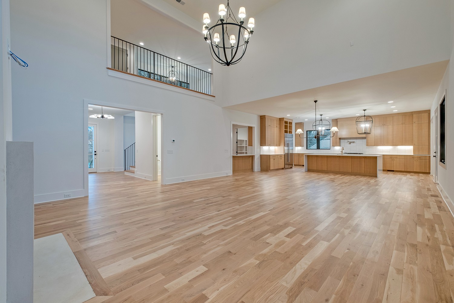2825 Sugar Tree Road Nashville, TN 37215 - Photo 22 of 51 a view of a living room a kitchen and a wooden floor