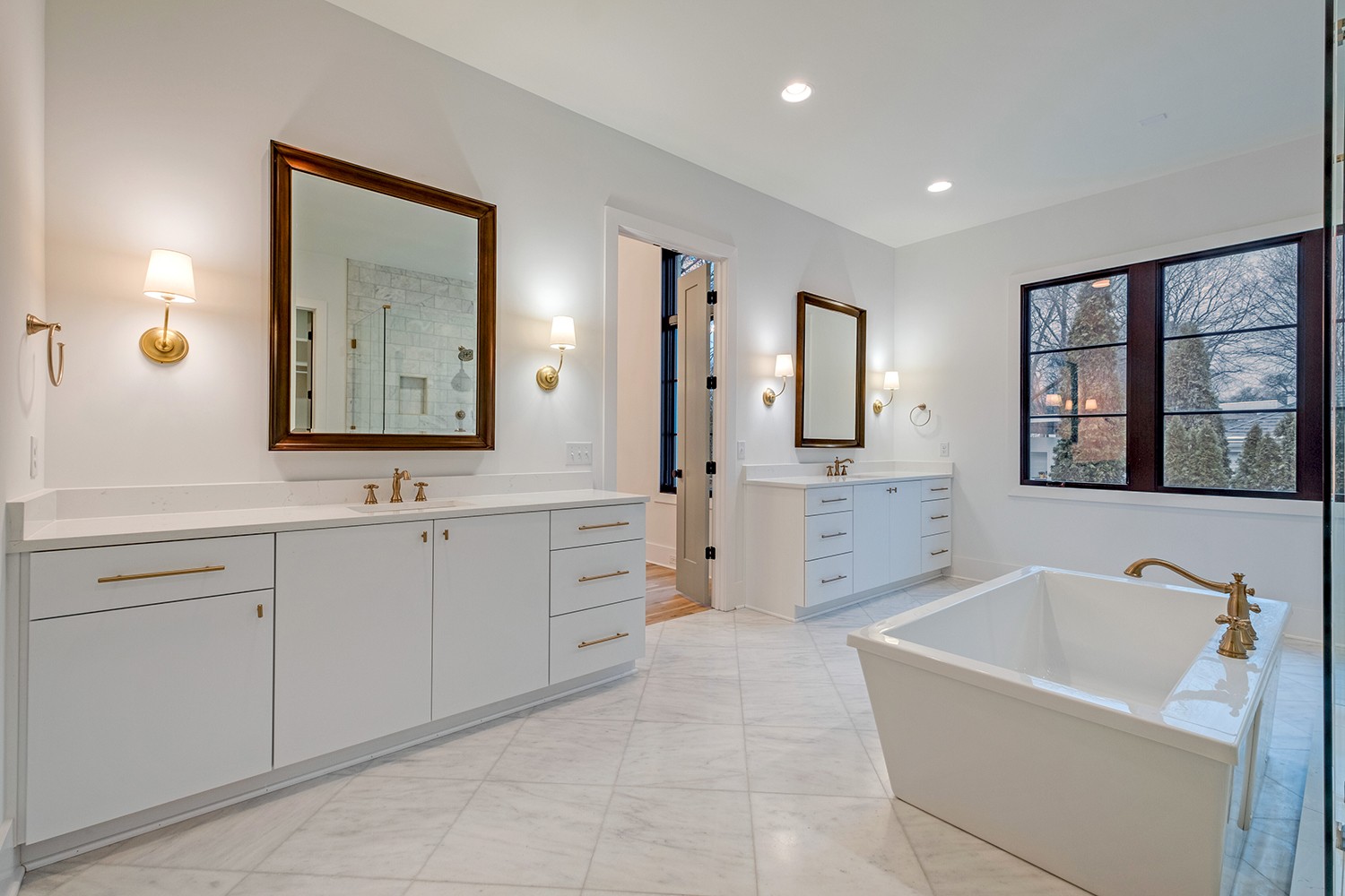 2825 Sugar Tree Road Nashville, TN 37215 - Photo 27 of 51 a spacious bathroom with a tub sink and mirror