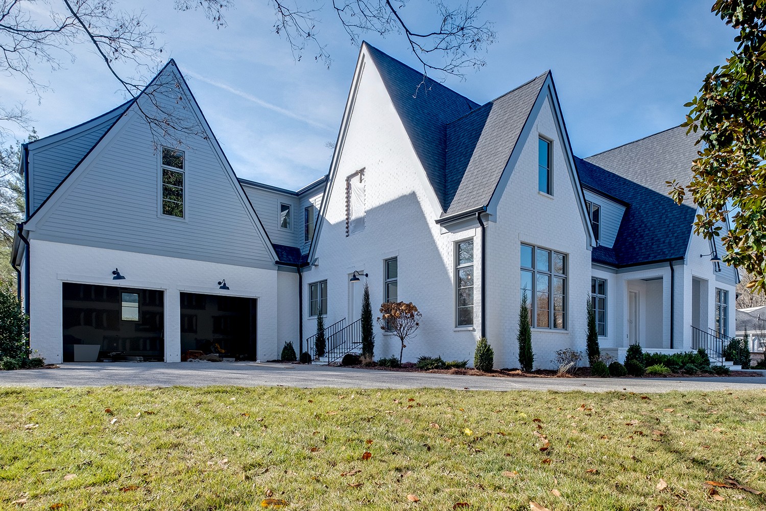 2825 Sugar Tree Road Nashville, TN 37215 - Photo 3 of 51 a view of a house with potted plants and a yard