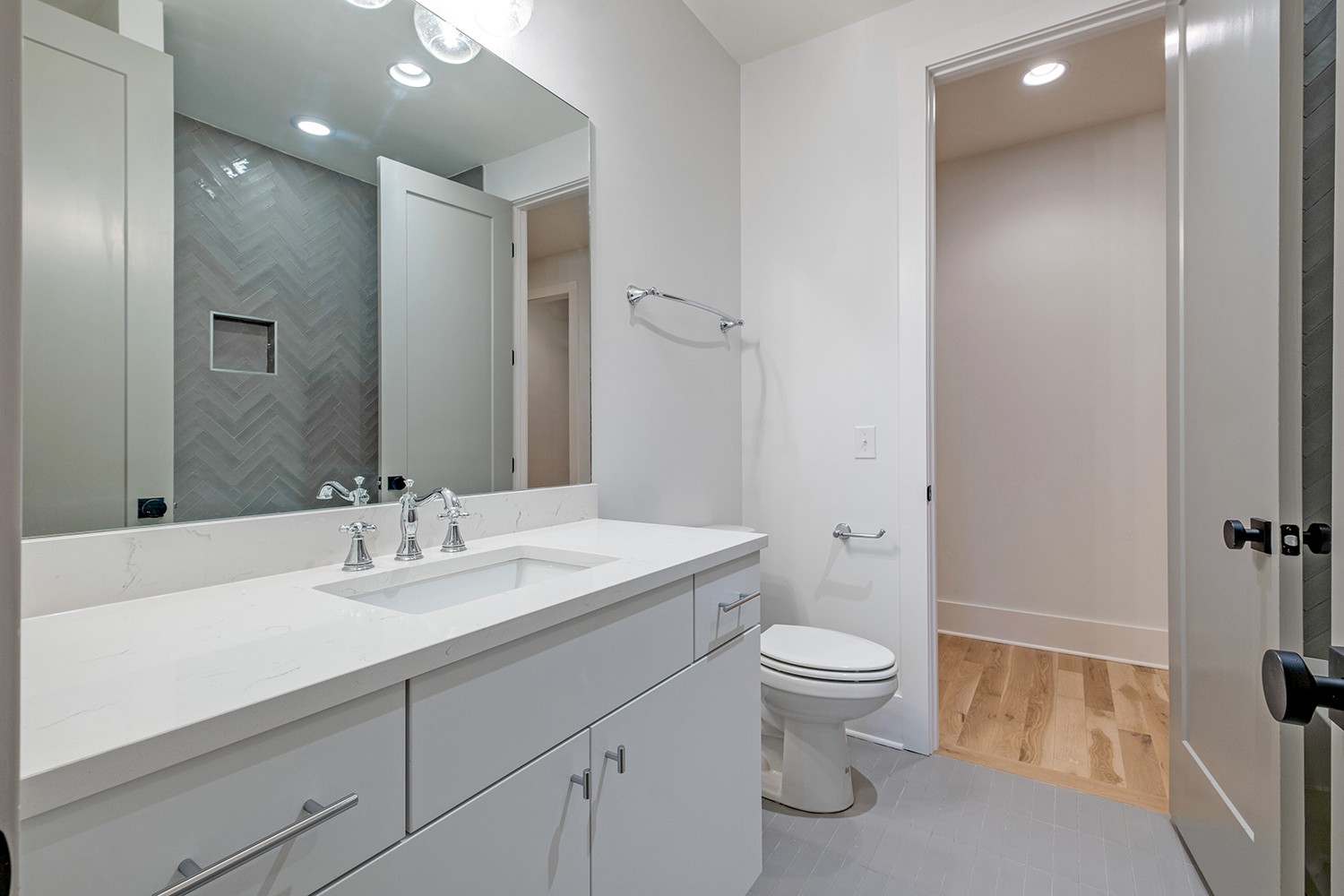 2825 Sugar Tree Road Nashville, TN 37215 - Photo 36 of 51 a bathroom with a sink a toilet a shower and a mirror