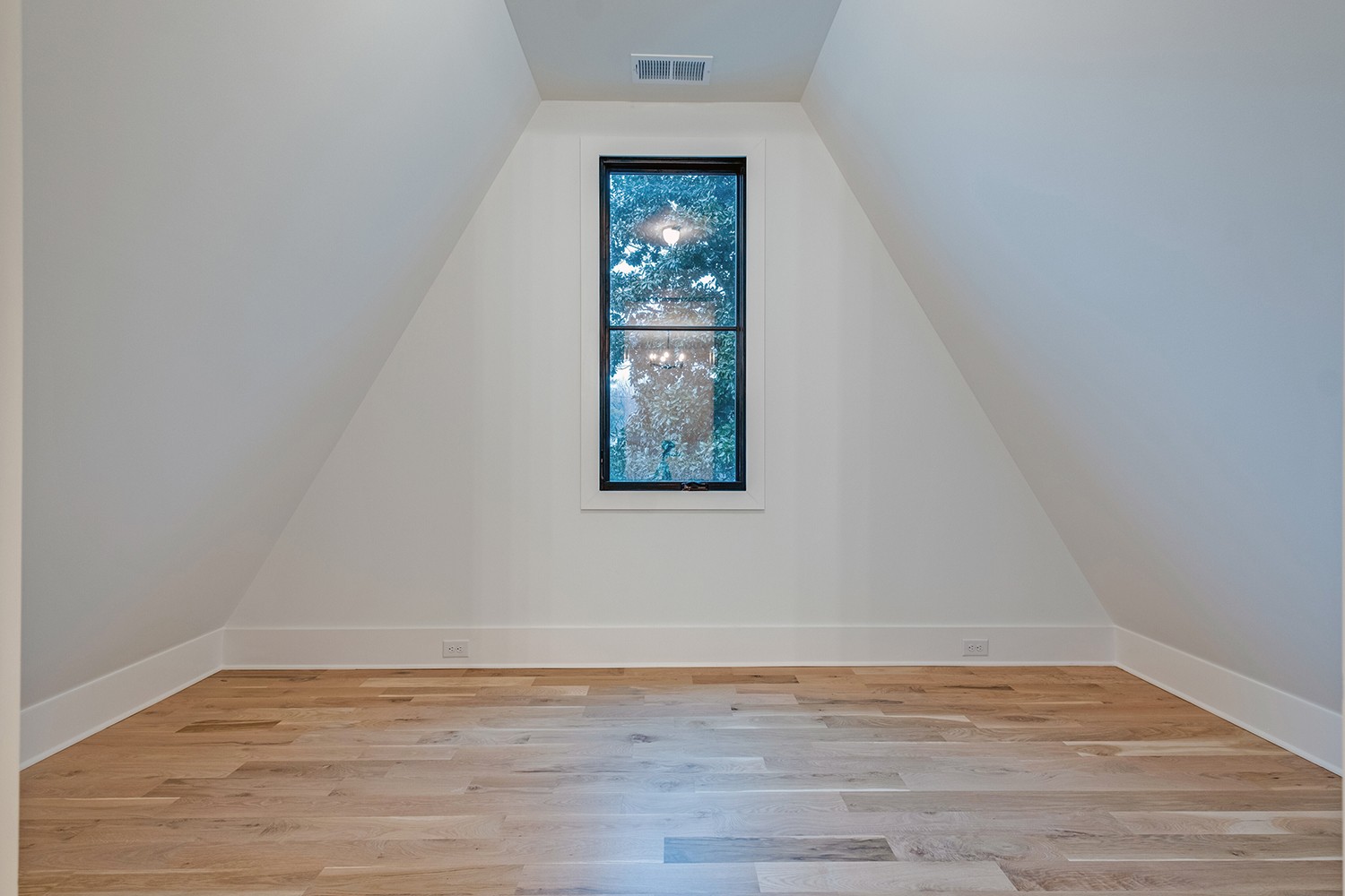 2825 Sugar Tree Road Nashville, TN 37215 - Photo 44 of 51 a view of an empty room with wooden floor and a window