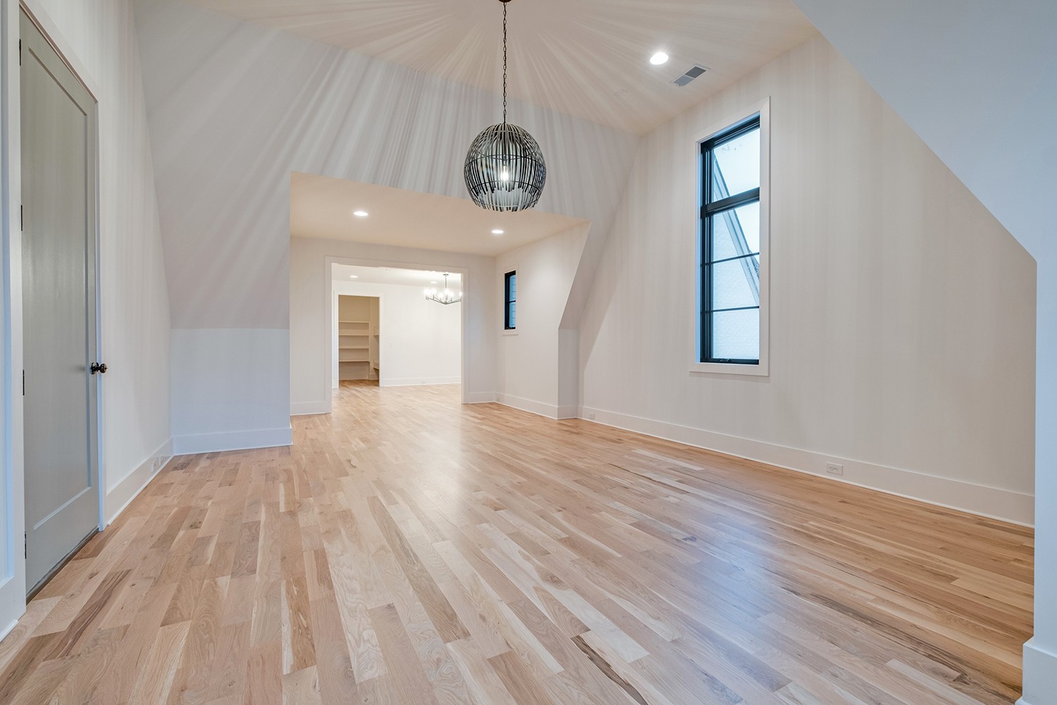 2825 Sugar Tree Road Nashville, TN 37215 - Photo 47 of 51 a view of an empty room with wooden floor and a window