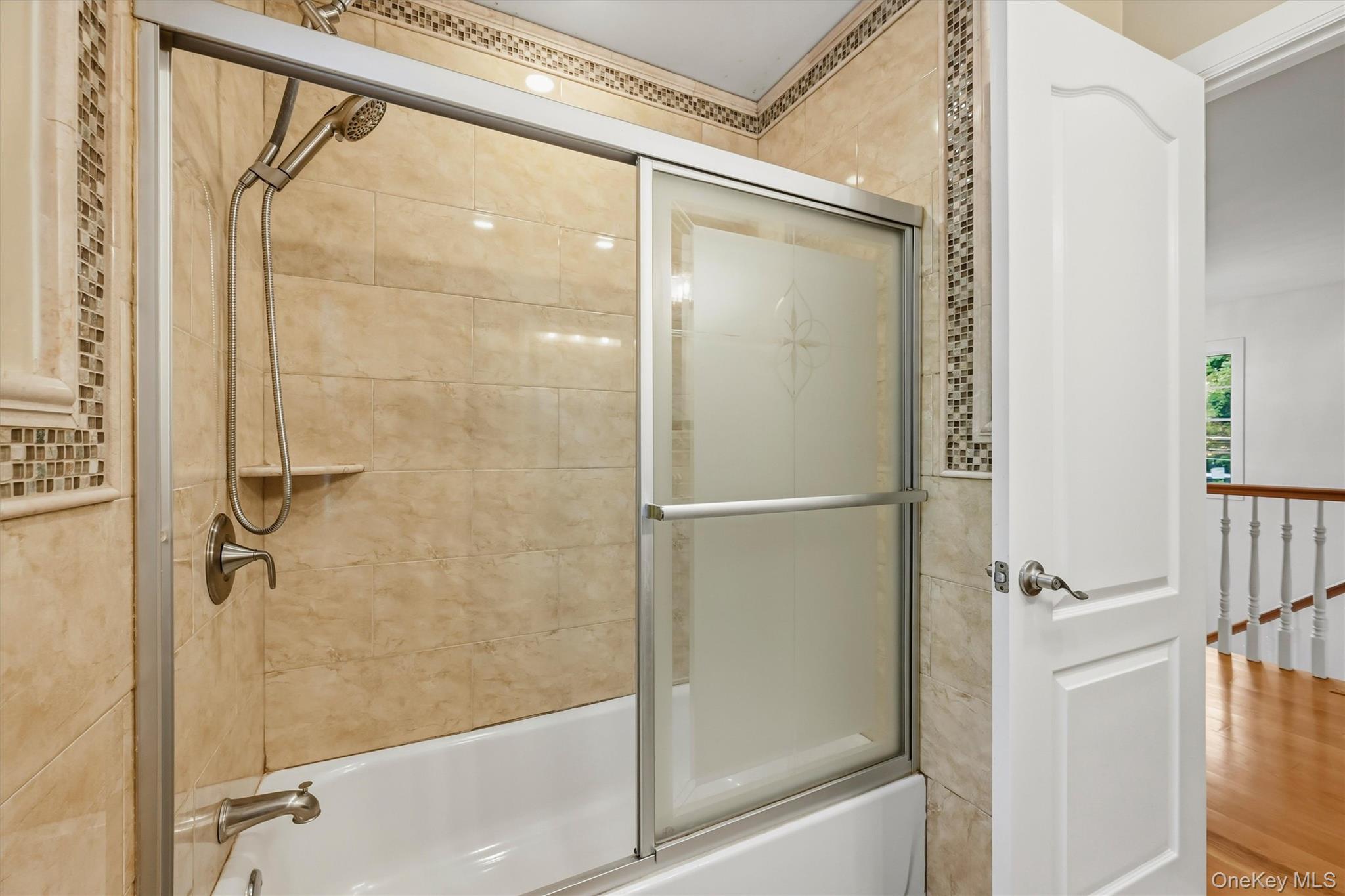 8 Darmstadter Road Bloomingburg, NY 12721 - Photo 33 of 47 Hallway bathroom, marble tile, Anderson window, recessed lighting.