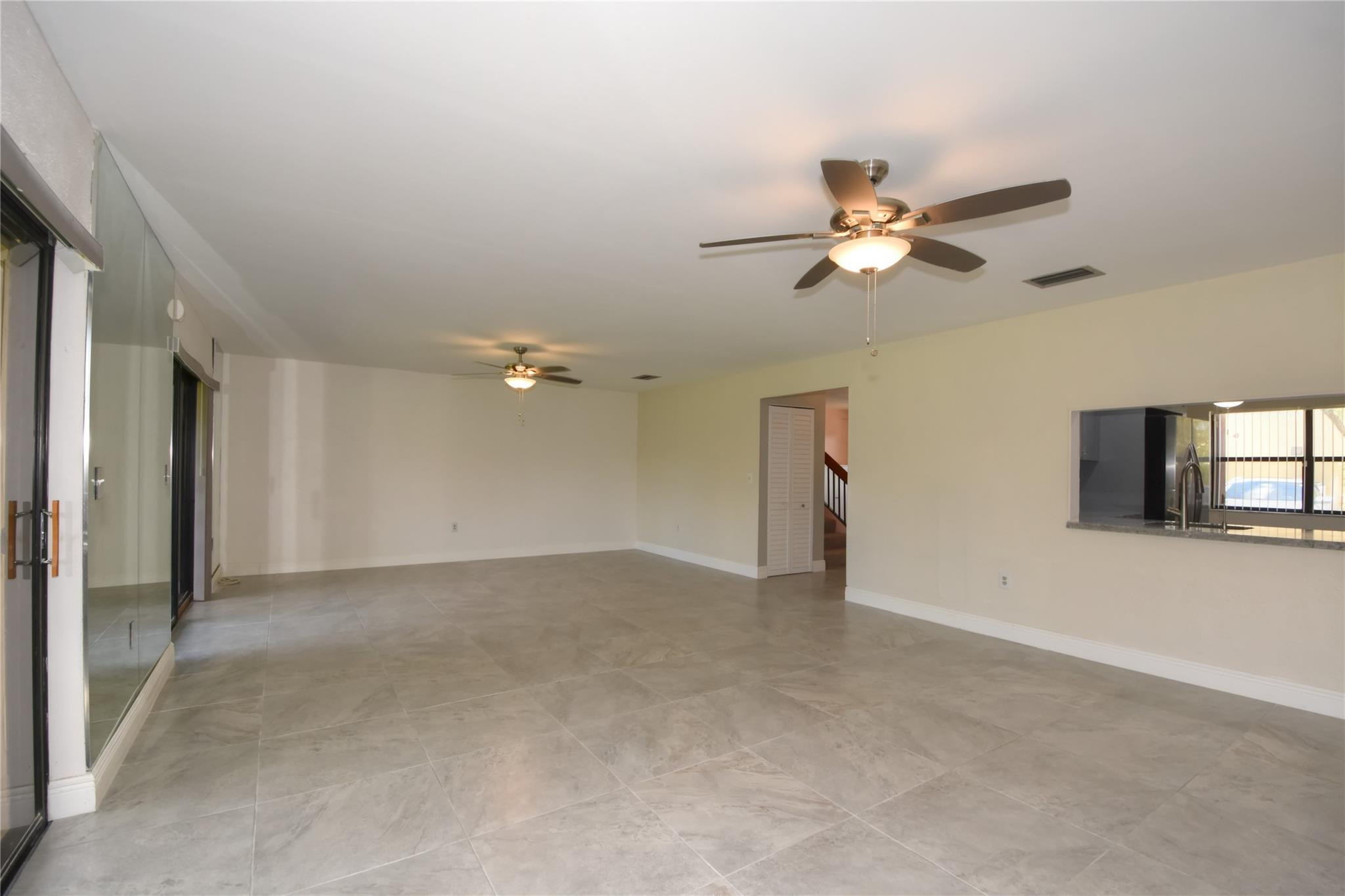 5467 Gate Lake Road, Unit 5467 Tamarac, FL 33319 - Photo 20 of 57 Family to Living Room View