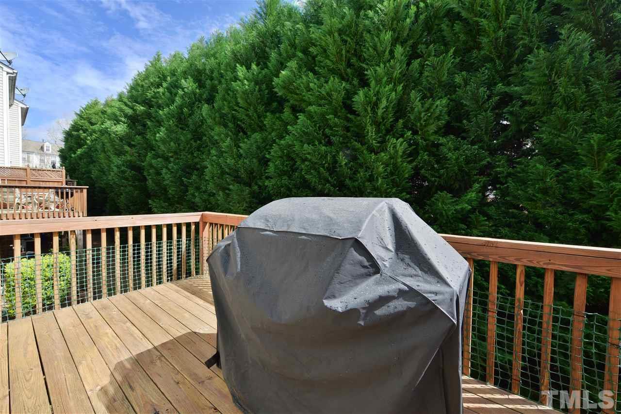 7228 Janston Drive Raleigh, NC 27613 - Photo 2 of 8 a view of balcony with wooden floor and fence