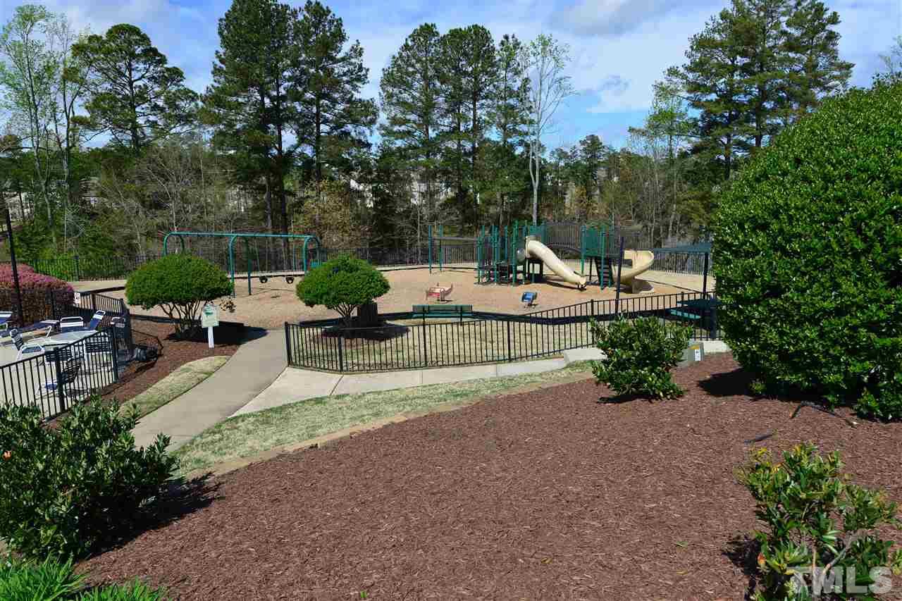 7228 Janston Drive Raleigh, NC 27613 - Photo 7 of 8 a view of a backyard with sitting area