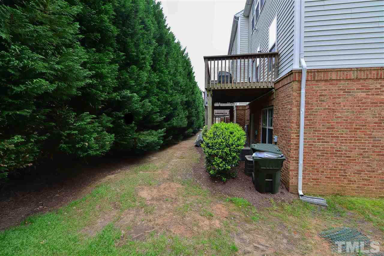 7228 Janston Drive Raleigh, NC 27613 - Photo 8 of 8 a view of entryway with garden