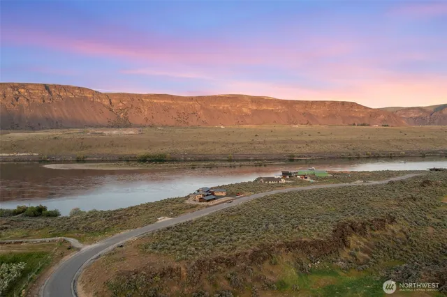 a view of an ocean and a mountain