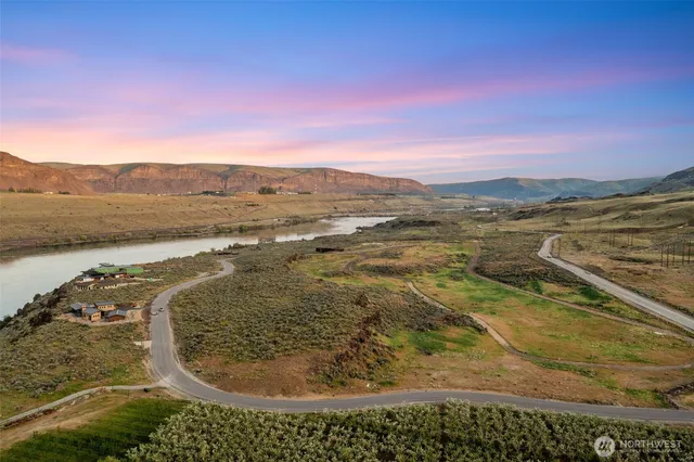 a view of a lake from a yard