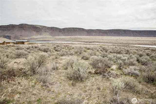 a view of mountain with lake view