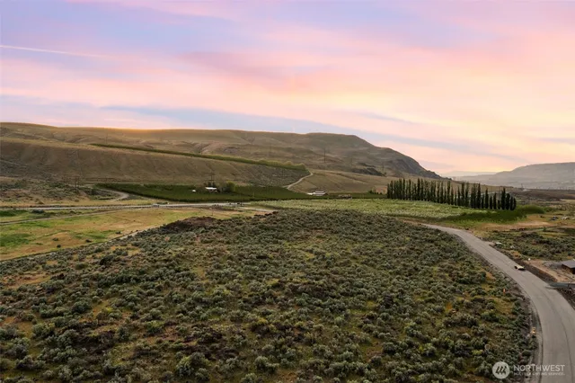 a view of an ocean and a mountain