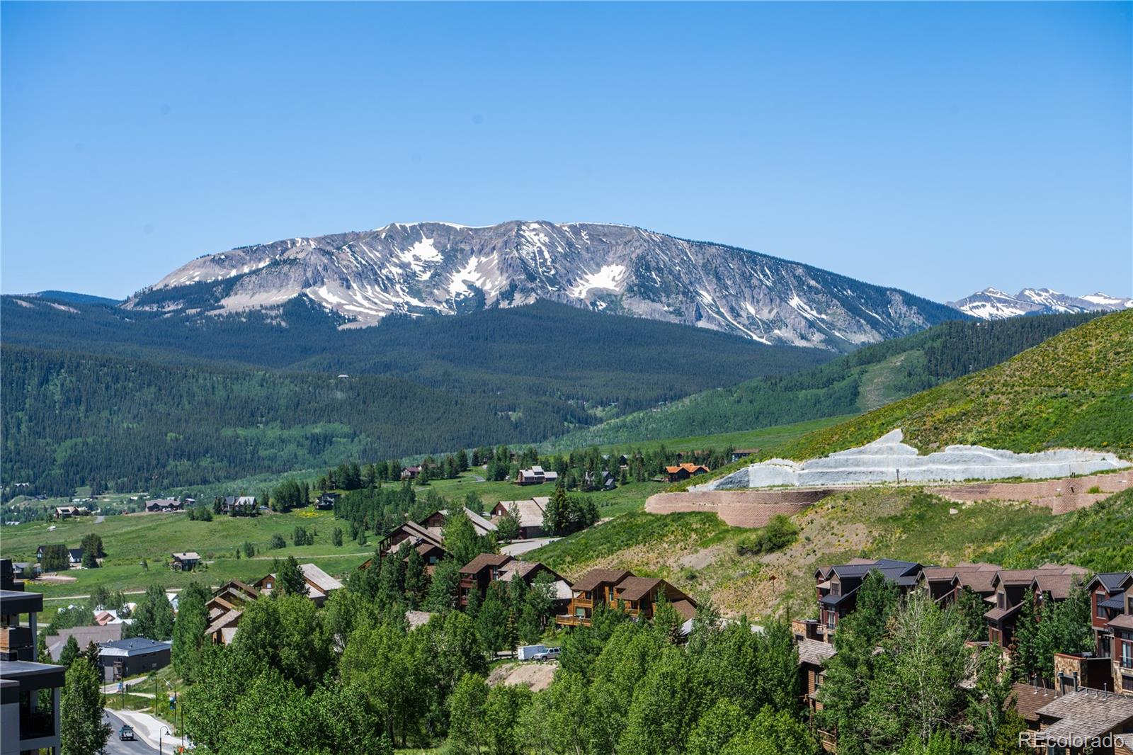 500 Gothic Road, Unit 541 Crested Butte, CO 81225 - Photo 18 of 22 a view of a backyard with green space