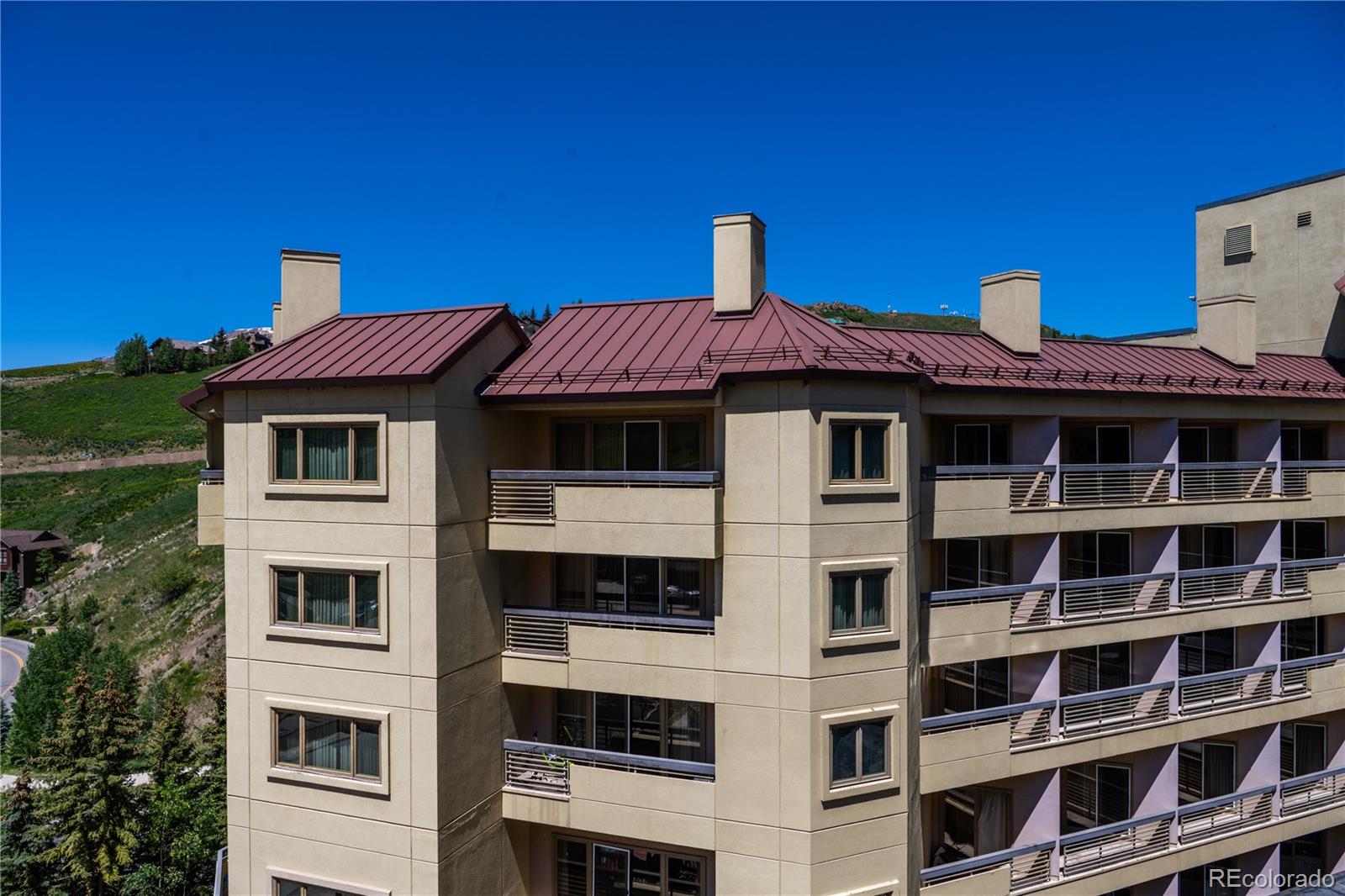 500 Gothic Road, Unit 541 Crested Butte, CO 81225 - Photo 19 of 22 a front view of a house with a door