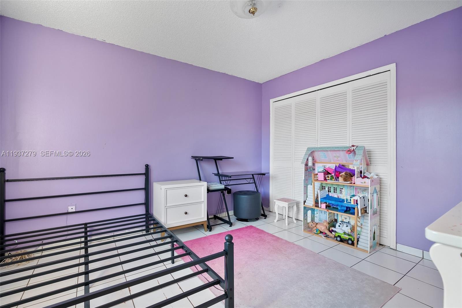 14256 Southwest 92nd Street Miami, FL 33176 - Photo 31 of 56 a bedroom with furniture and a wooden floor