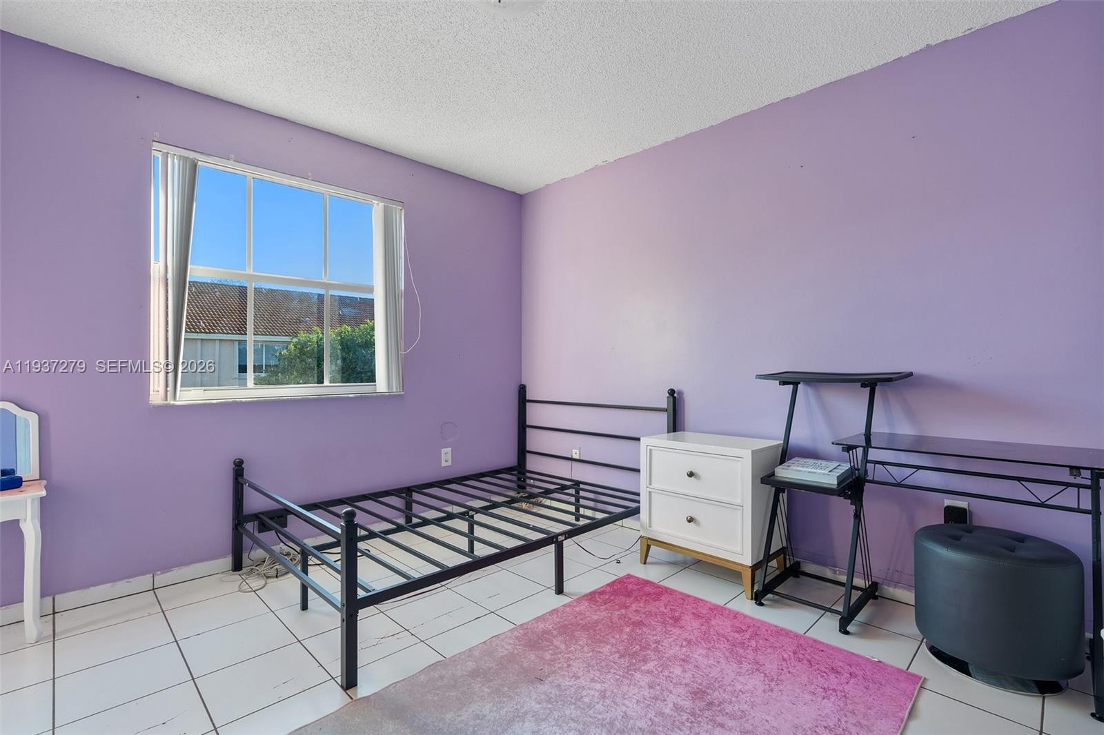 14256 Southwest 92nd Street Miami, FL 33176 - Photo 32 of 56 a living room with furniture