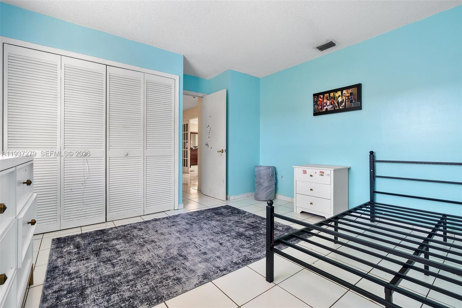14256 Southwest 92nd Street Miami, FL 33176 - Photo 35 of 56 a view of a hallway with wooden floor and cabinet