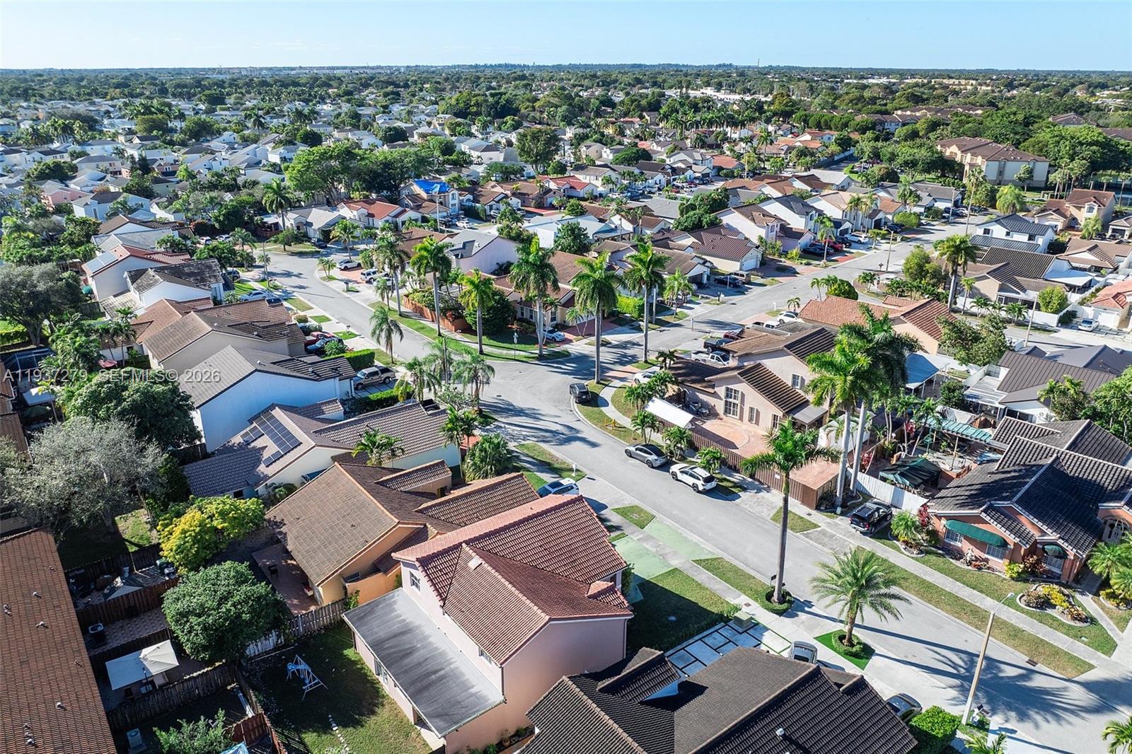 14256 Southwest 92nd Street Miami, FL 33176 - Photo 44 of 56 an aerial view of a city with lots of residential buildings