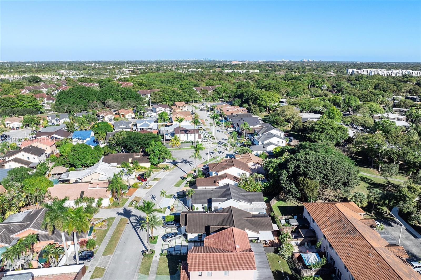 14256 Southwest 92nd Street Miami, FL 33176 - Photo 47 of 56 an aerial view of residential houses with outdoor space and street view