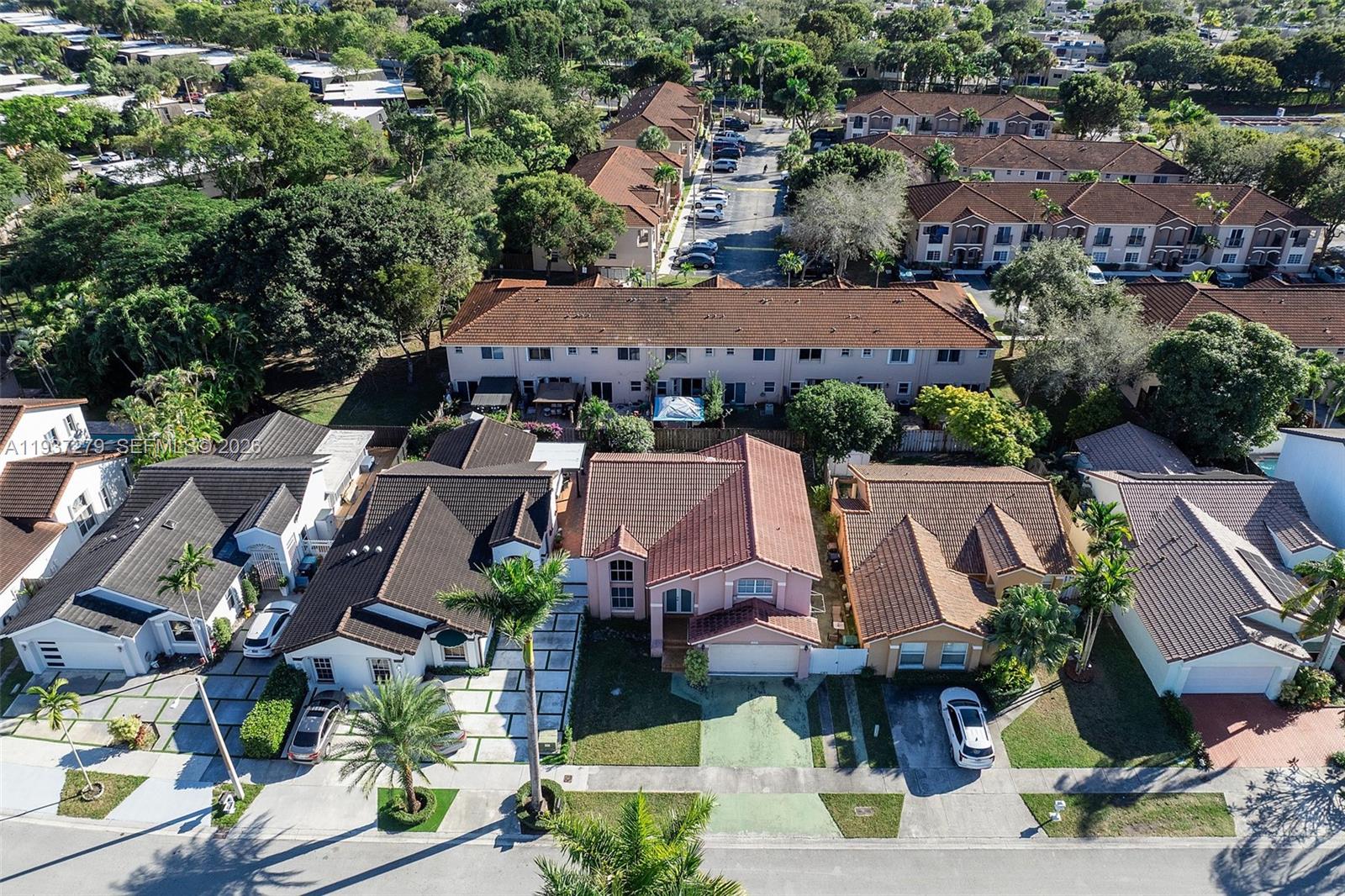 14256 Southwest 92nd Street Miami, FL 33176 - Photo 49 of 56 an aerial view of house with yard swimming pool and ocean view