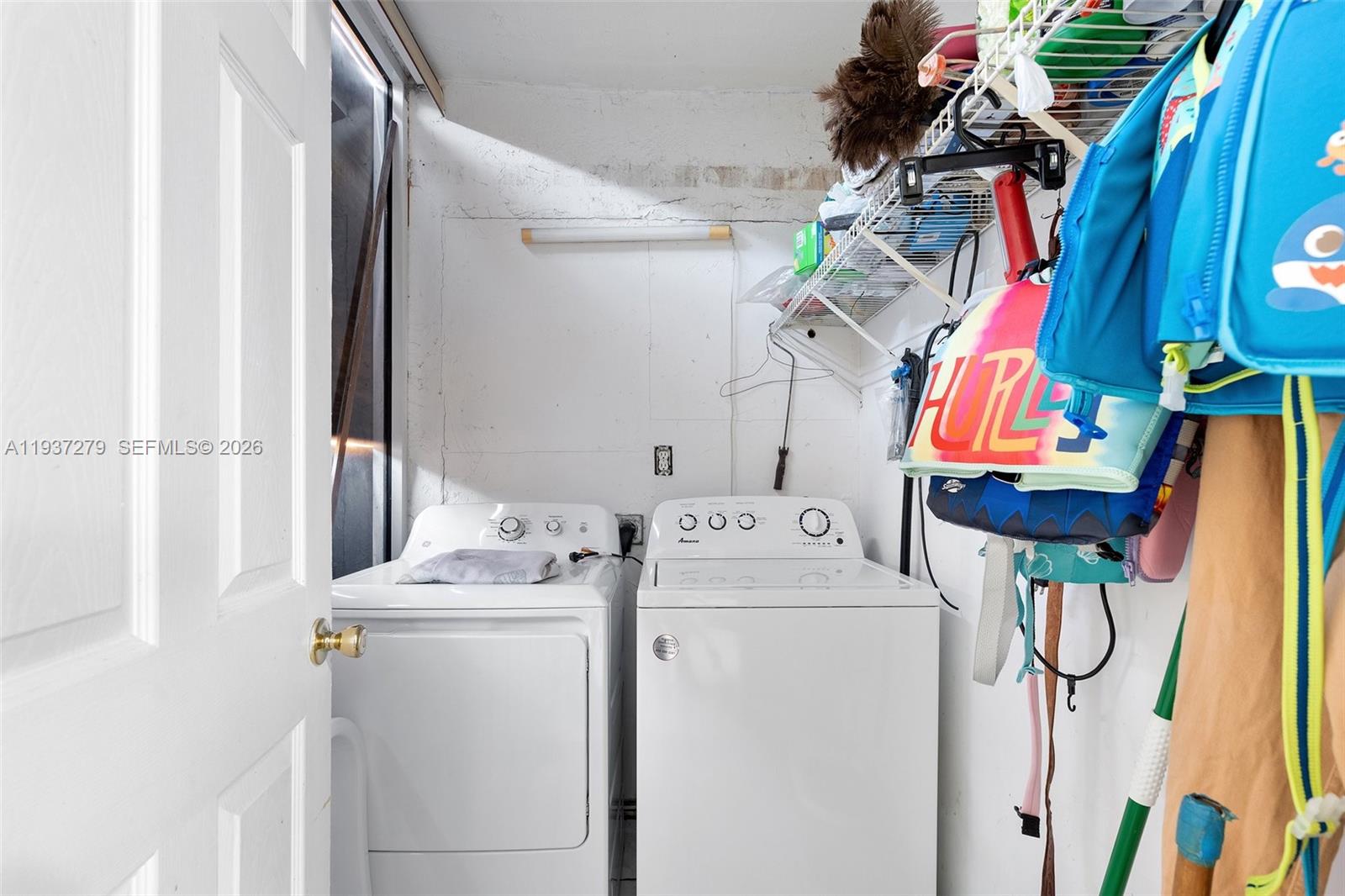14256 Southwest 92nd Street Miami, FL 33176 - Photo 50 of 56 a utility room with dryer and washer