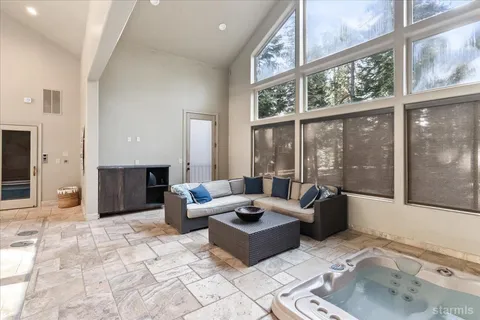 a bathroom with a glass shower door