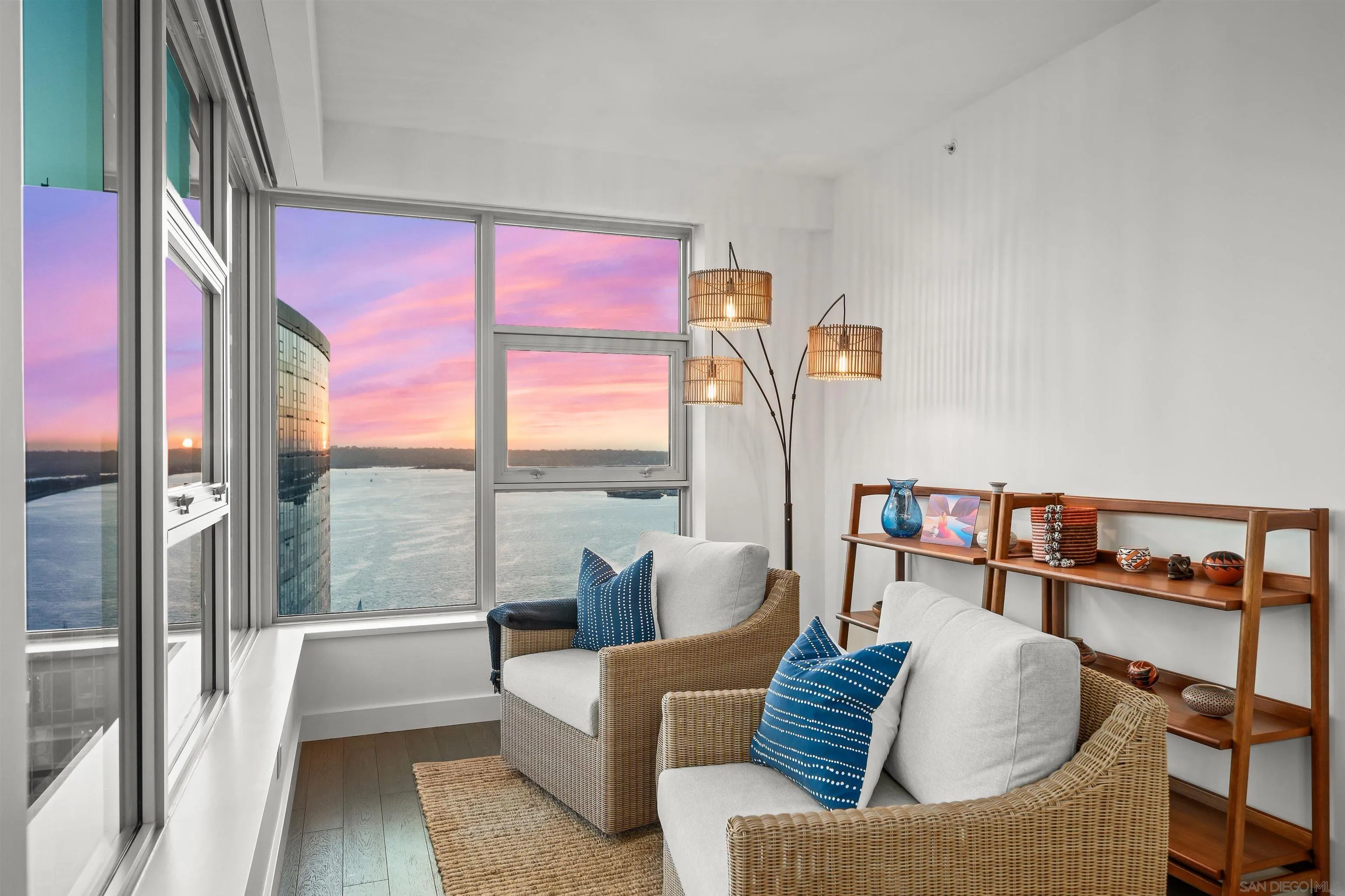 1388 Kettner Boulevard, Unit 3205 San Diego, CA 92101 - Photo 11 of 53 a living room with furniture and a floor to ceiling window