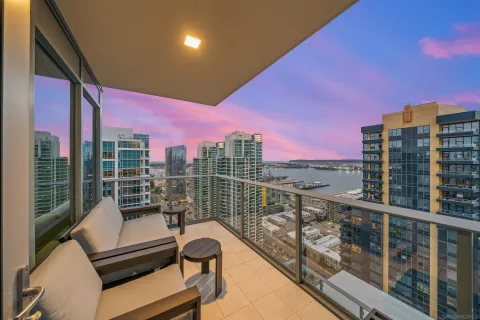 a view of a balcony with city view
