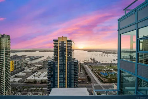 a view of a city with tall buildings