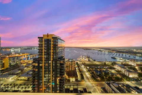 a view of city with ocean