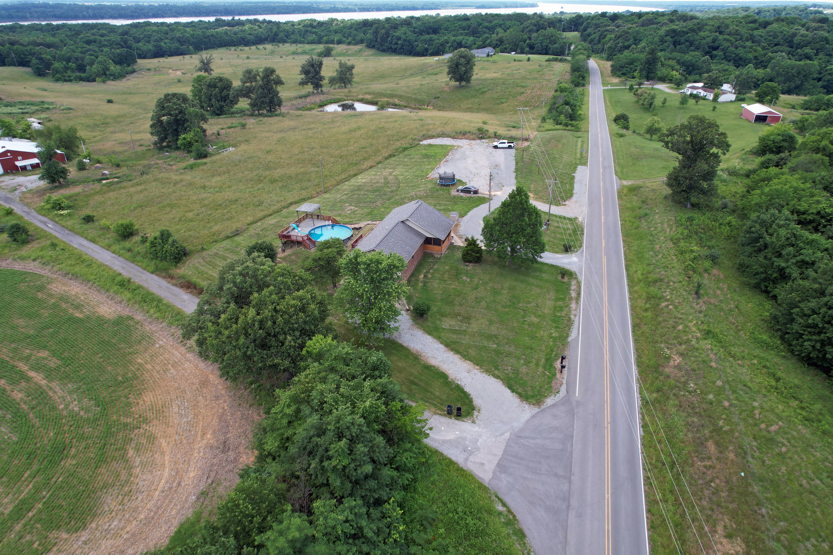 5488 Tick Ridge Road Grand Chain, IL 62941 - Photo 52 of 55 an aerial view of a house with outdoor space and lake view