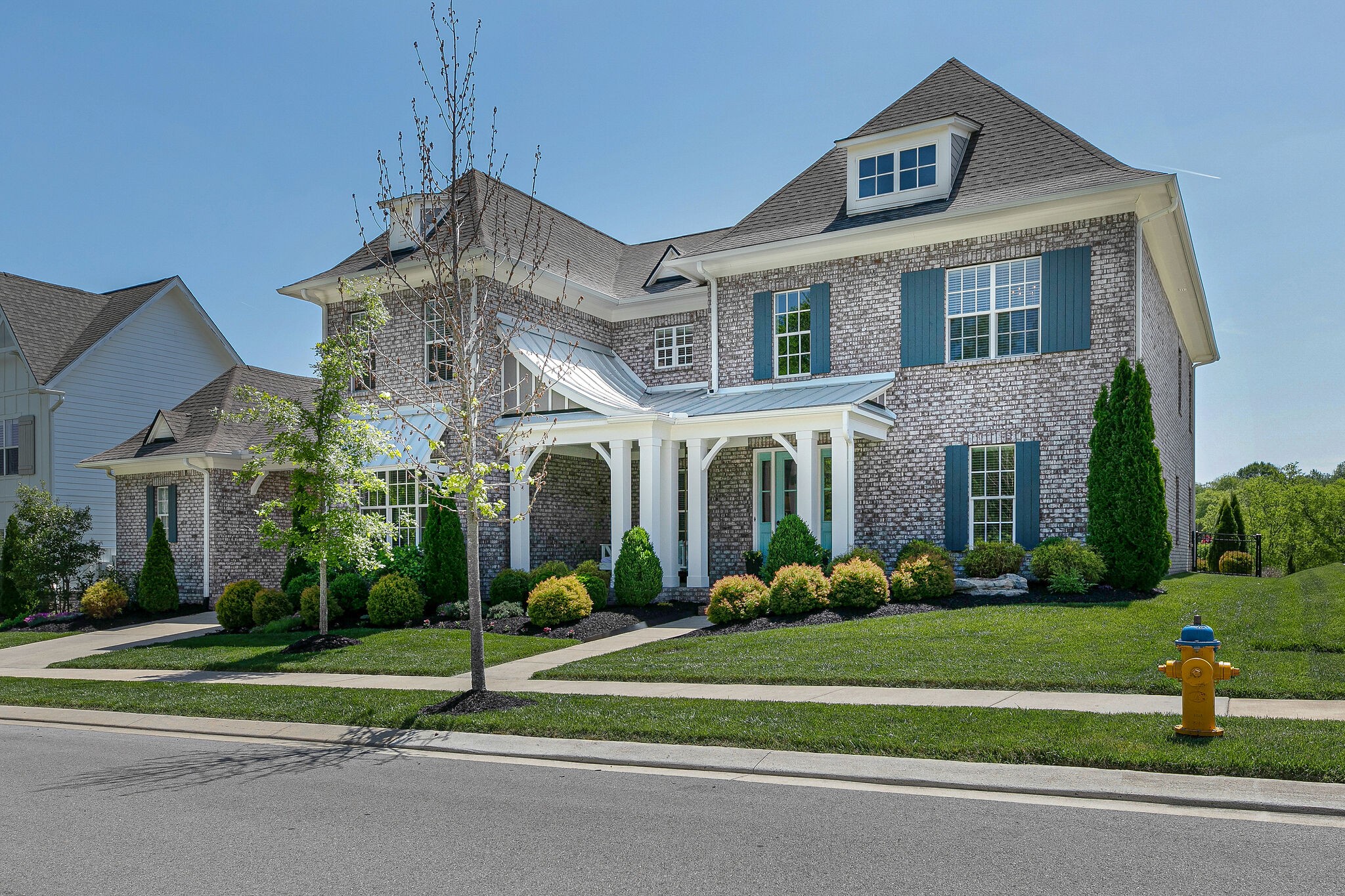 424 Beamon Drive Franklin, TN 37064 - Photo 2 of 52 a front view of a house with a yard
