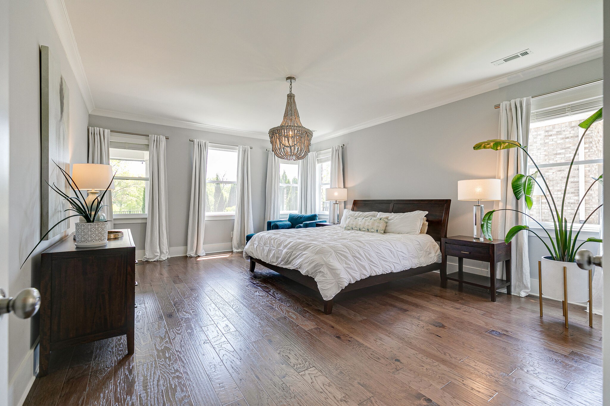 424 Beamon Drive Franklin, TN 37064 - Photo 24 of 52 a large bedroom with wooden floor outdoor seating and windows